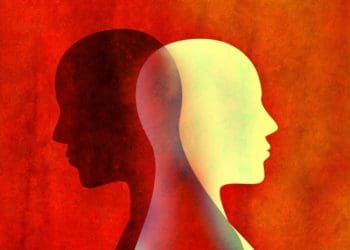 silhouette of contrasting faces in opposite directions