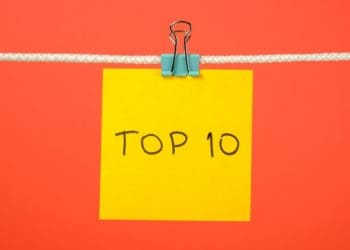 yellow top 10 post-it note on orange background