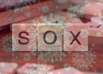 SOX spelled on wooden tiles with overlay of coronavirus