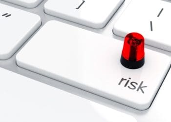 risk key on keyboard with flashing red light