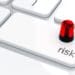 risk key on keyboard with flashing red light