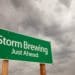 Storm Brewing Just Ahead Green Road Sign with Dramatic Storm Clouds and Sky