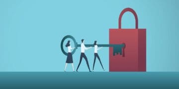 team holding giant key together, inserting giant lock