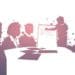 silhouetted figures around conference table