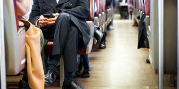 businessman commuting on a train