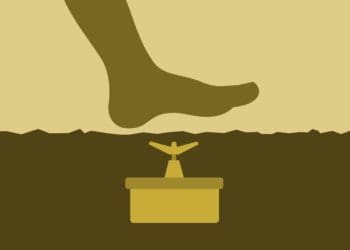 illustration of foot stepping on buried landmine