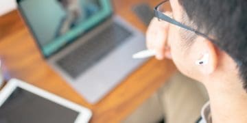 man in online meeting with one person