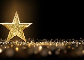 golden star on black background