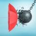 wrecking ball breaking on red umbrella