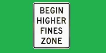 begin higher fines zone road sign on green background