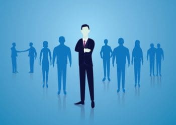 illustration of executive standing center stage with team in silhouette behind him