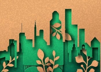 green city papercut on recycled paper background