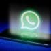 Hologram of whatsapp logo over smartphone