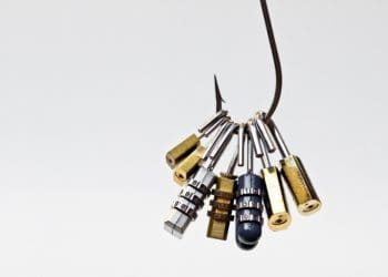 phishing concept: fish hook with security locks on white background