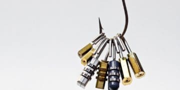 phishing concept: fish hook with security locks on white background