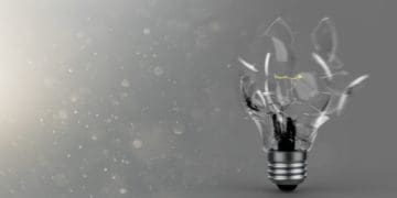 bursting light bulb, concept of digital disruption