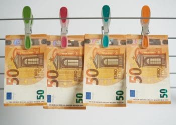 Euros hung with pins on clothesline