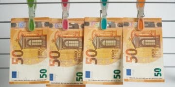 Euros hung with pins on clothesline