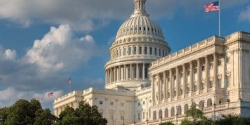 American flag flying outside U.S. capitol building