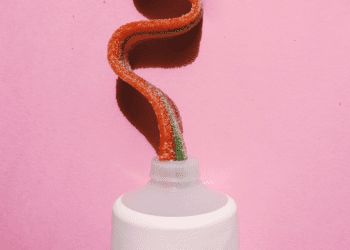 candy toothpaste oozing from a tube