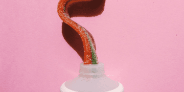 candy toothpaste oozing from a tube