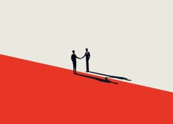 two figures shaking hands across line