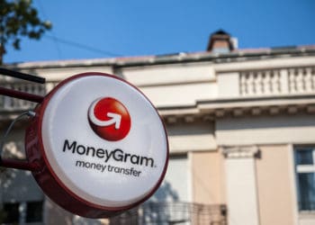 The moneygram sign outside of a retail location