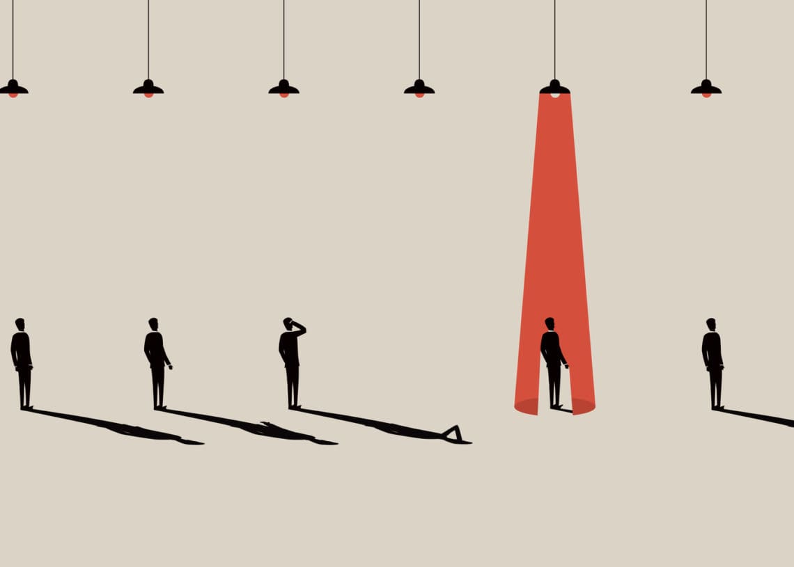 illustrations of professionals stand under lights. Only one is lit, shining down on one. Another person scratches their head.