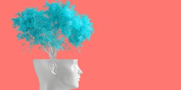 A fake tree grows out of a mannequin's head