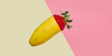 A collage combines the bottom of a banana with the top of a strawberry, an abstract representation of the difference between vendor side and in-house compliance.