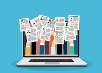 Illustration of a laptop showing a dozen hands holding up their resumes.