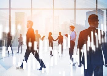 people walking in crowded office lobby