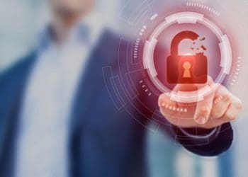 man touching virtual screen with red padlock, concept of cyber risk