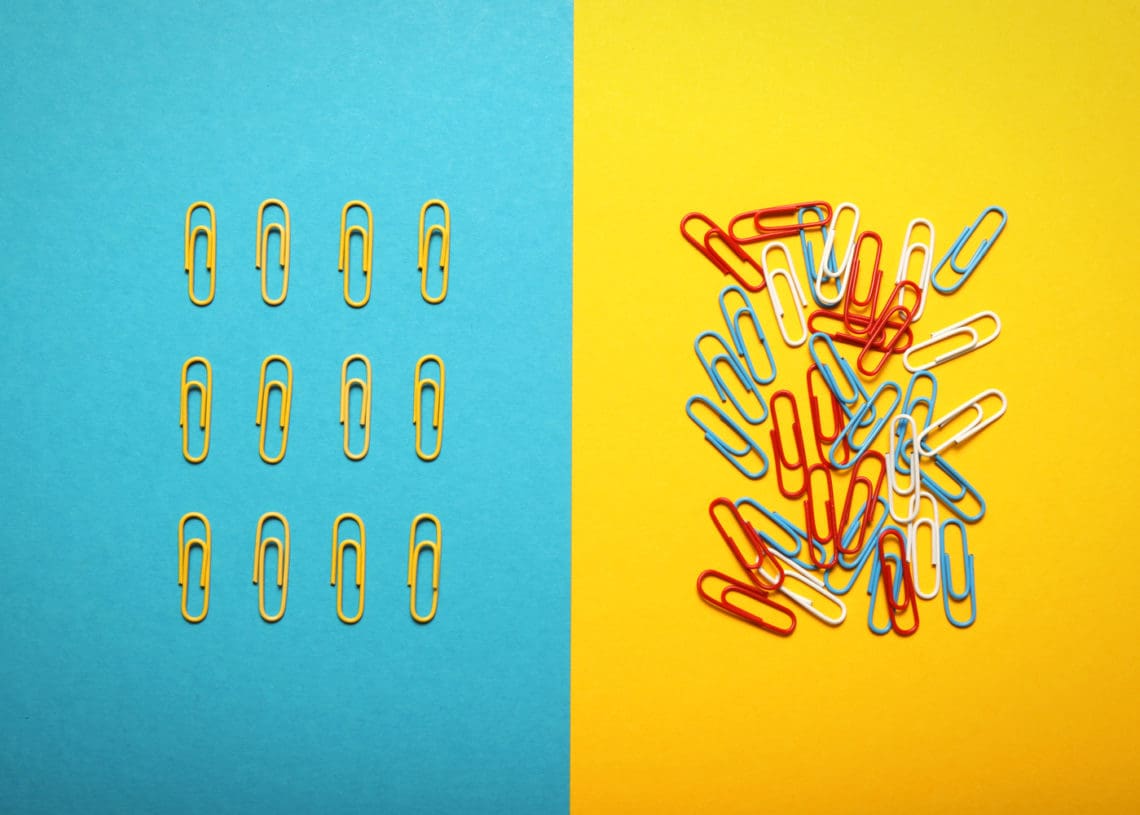 Piles of paper clips illustrate concepts of order and chaos.