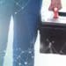 repairman standing with toolbox