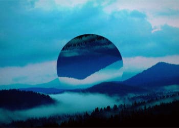 Abstract landscape photo involving a sphere in the center rotated upside down.