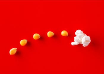 popcorn kernels begin to pop