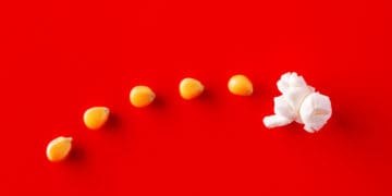 popcorn kernels begin to pop