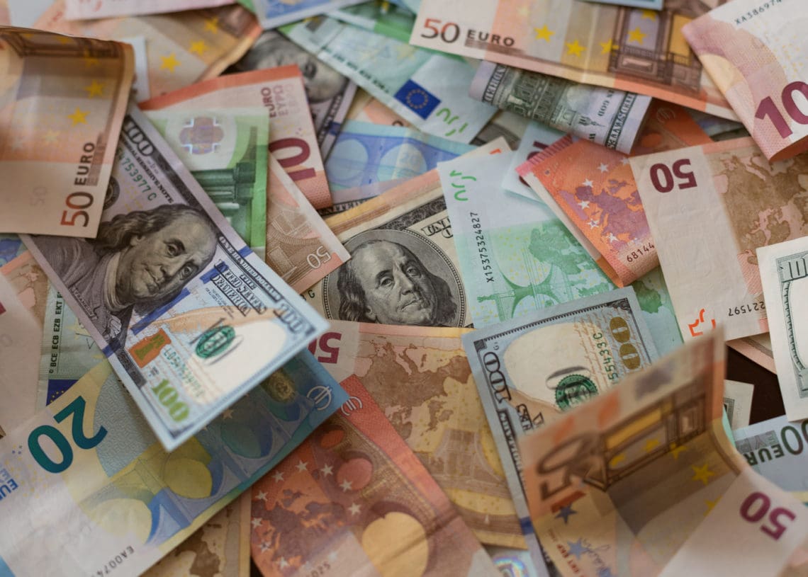 A pile of different currencies from around the world