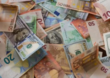 A pile of different currencies from around the world