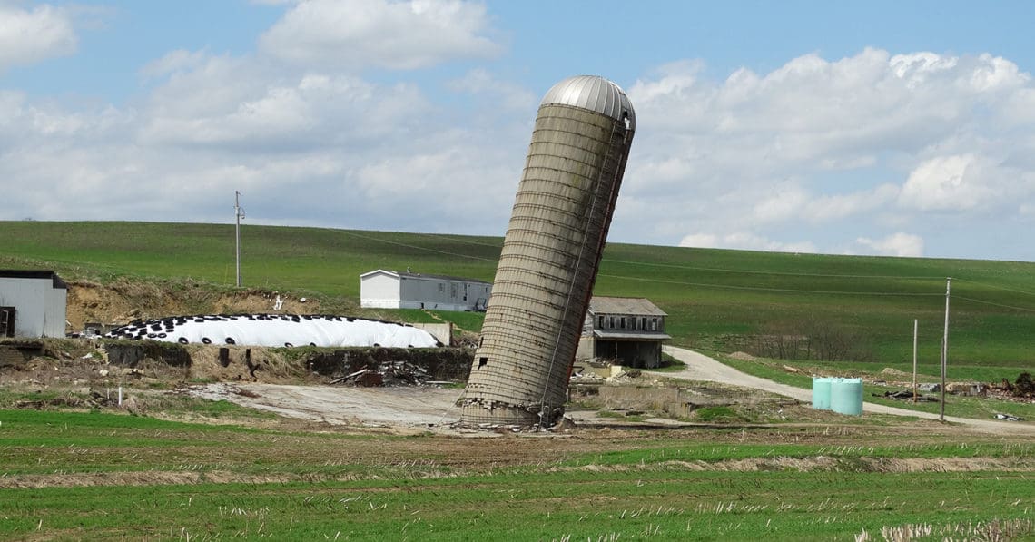 farm silo leaning over