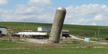 farm silo leaning over
