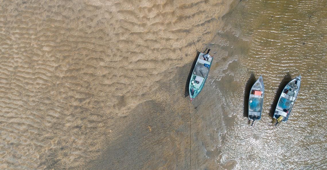 boats stuck at low tide