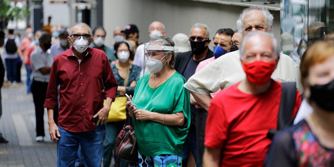 people waiting in covid line