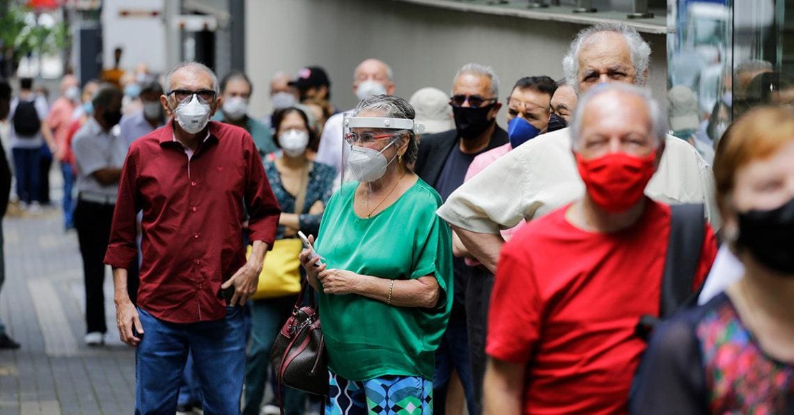 people waiting in covid line