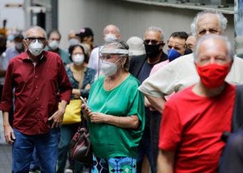 people waiting in covid line