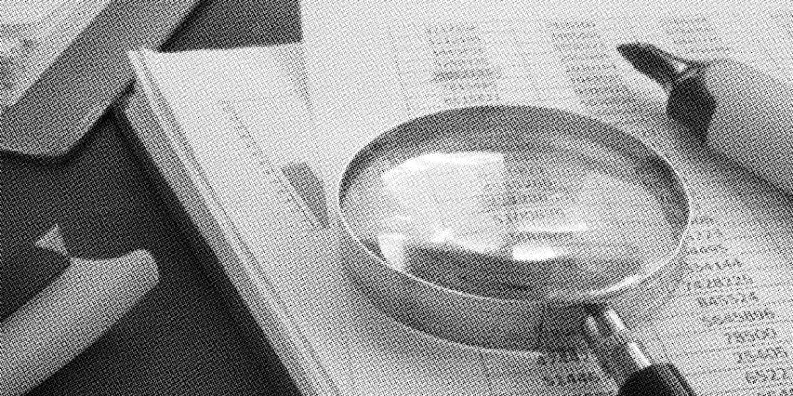 magnifying glass on numbers