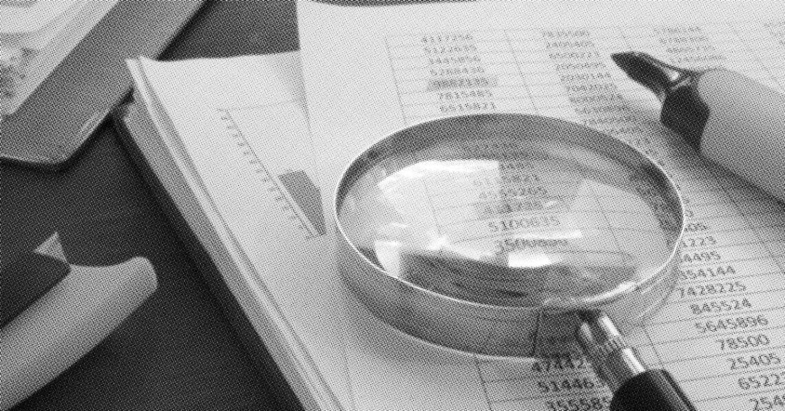 magnifying glass on numbers