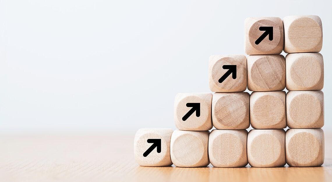 Wooden blocks as stairs pointing up