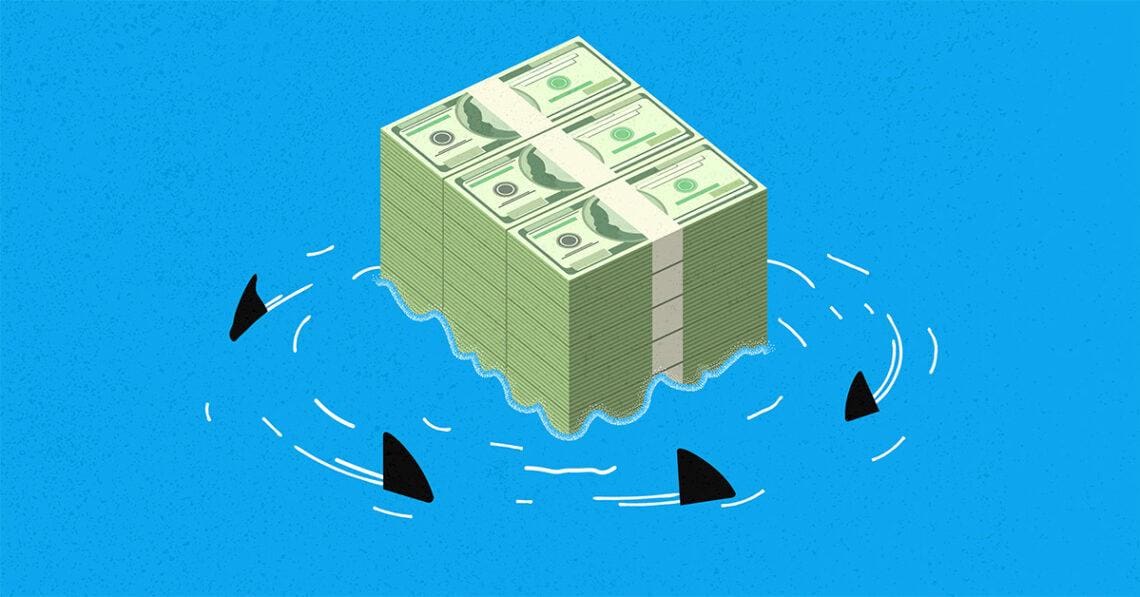 sharks swimming around money